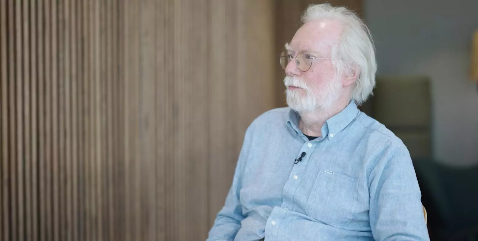 Paul Collier sitting in the interview