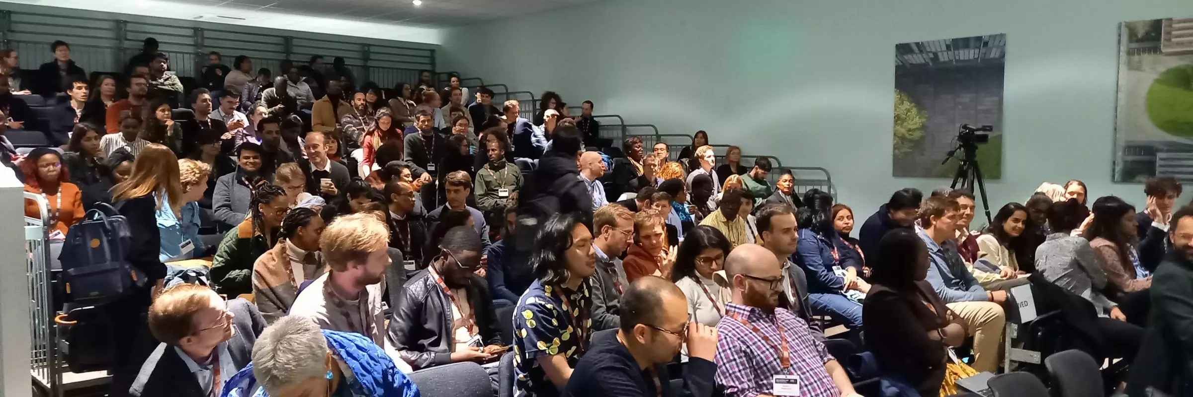 Photograph of a full lecture theatre at the CSAE Conference 2024