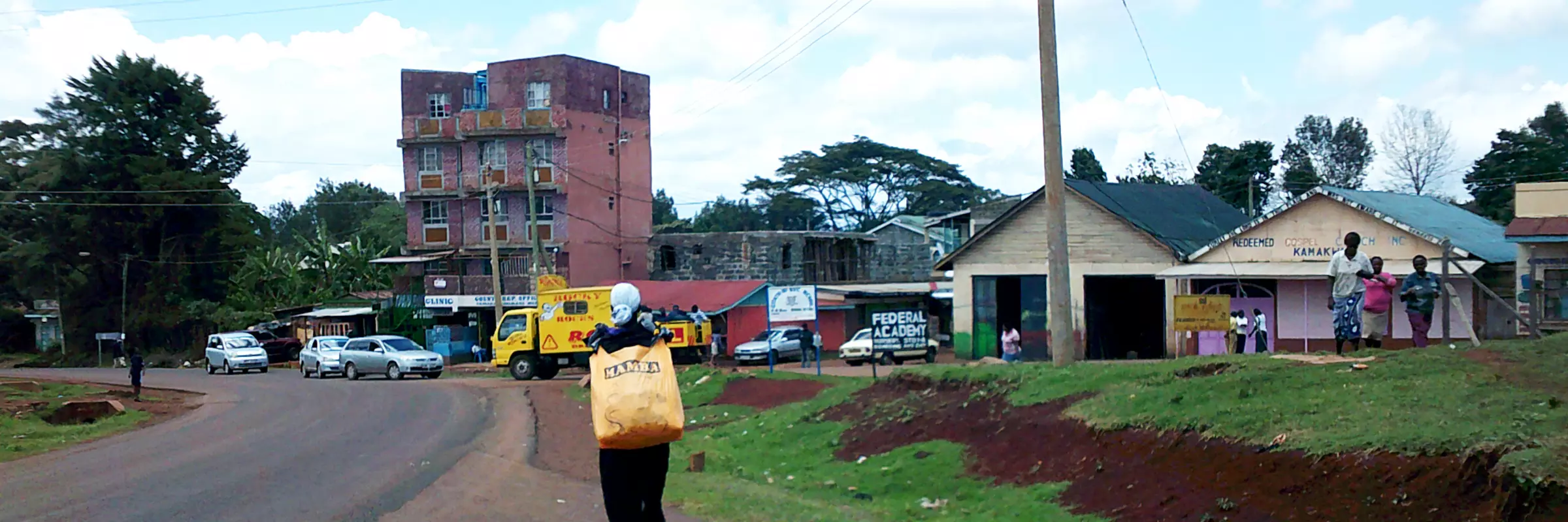 Person carrying chewing gum in a bag to sell in Kenya